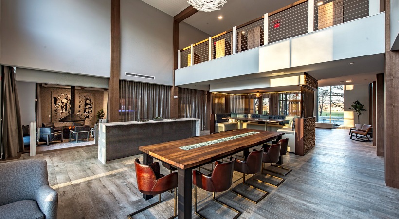 Clubroom with billiards, wet bar, tv and library